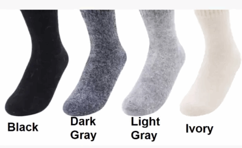 Four pairs of socks in black, dark gray, light gray, and ivory on a white background.