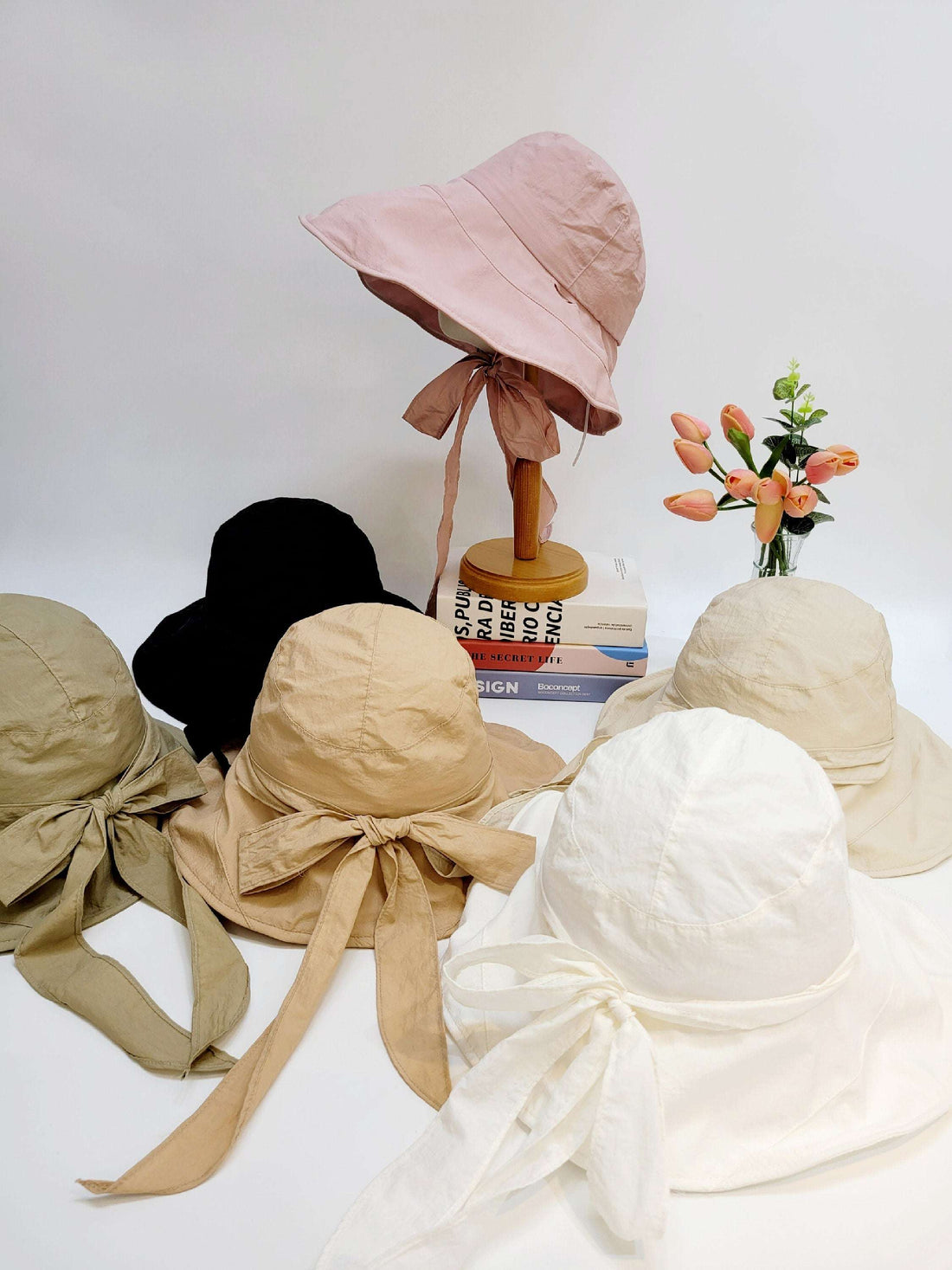 my fair lady sun hats in pink, black, beige, white, and olive. Wide brim hats with tie closures, perfect for sun protection