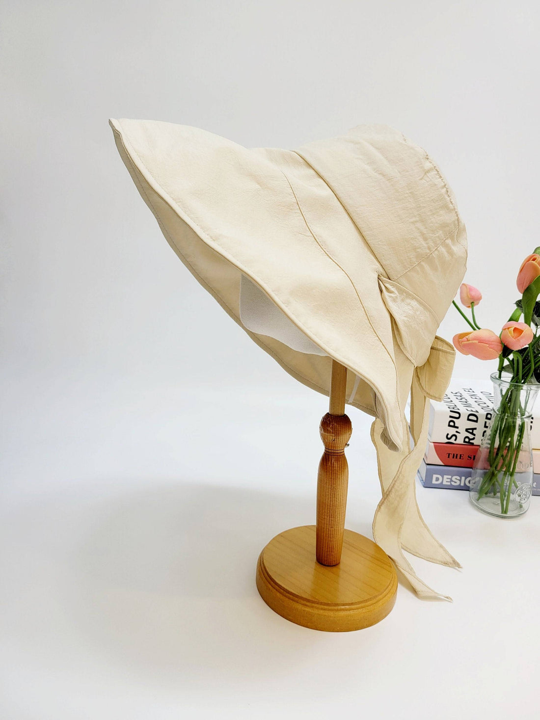 my fair lady beige sun hat with a wide brim and tie detail, perfect for summer and sun protection.