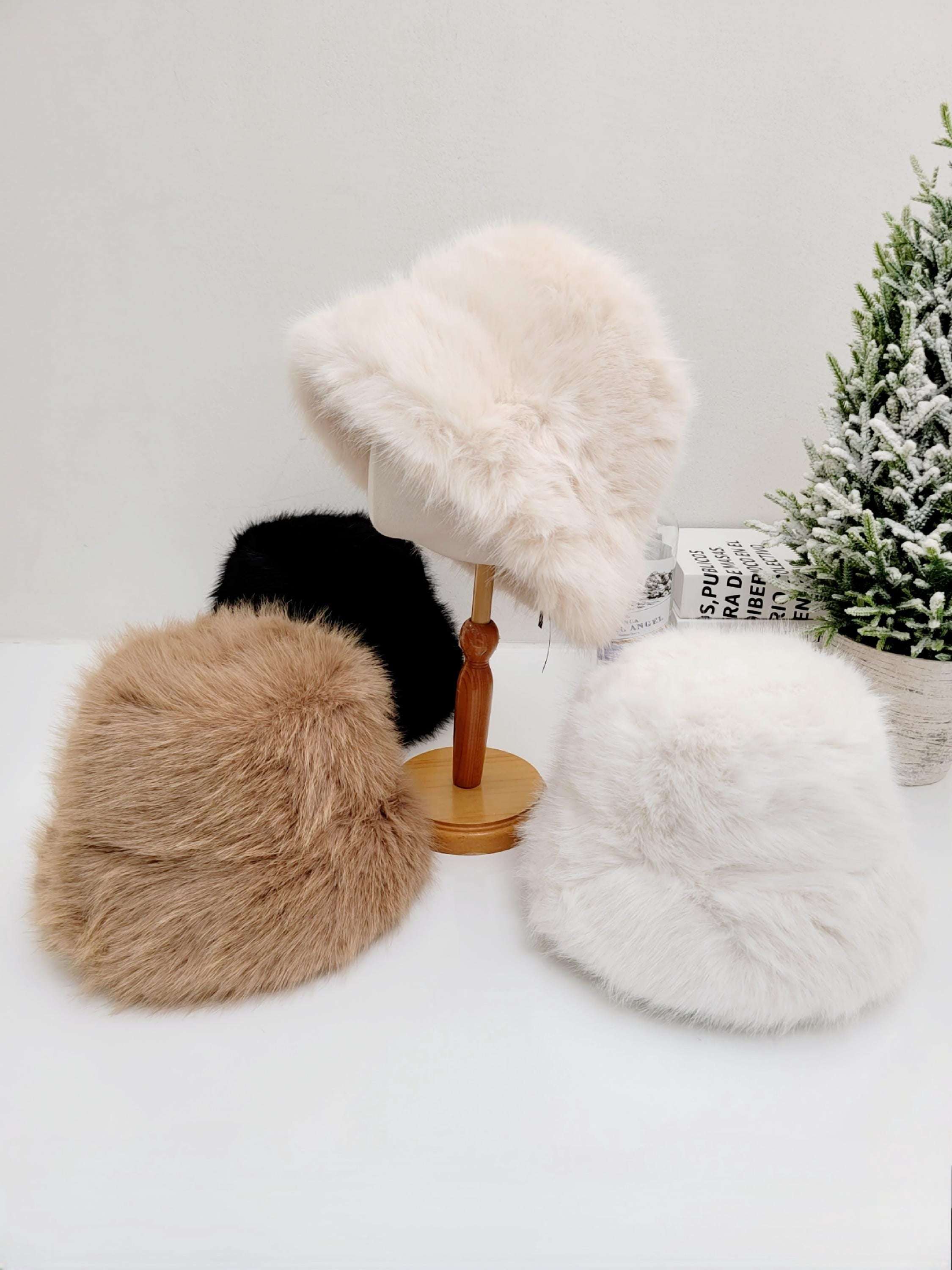 
FAKE FUR ANGELINA WINTER SPY hats in cream, brown, white, and black. Soft, plush faux fur bucket hats for winter warmth and style.
