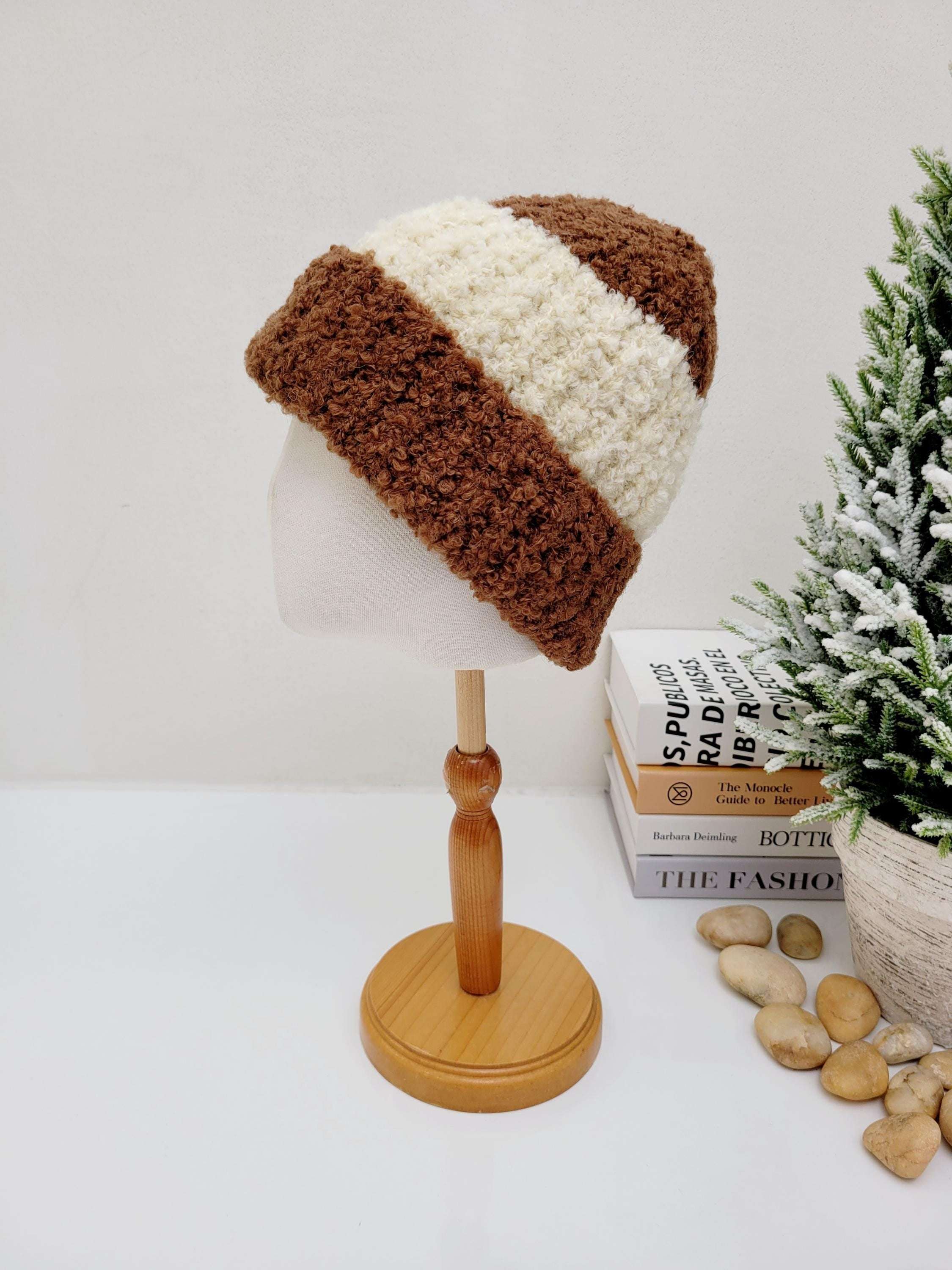 tokyo beanie - 2tone: Brown and cream striped, textured knit beanie on a mannequin head.