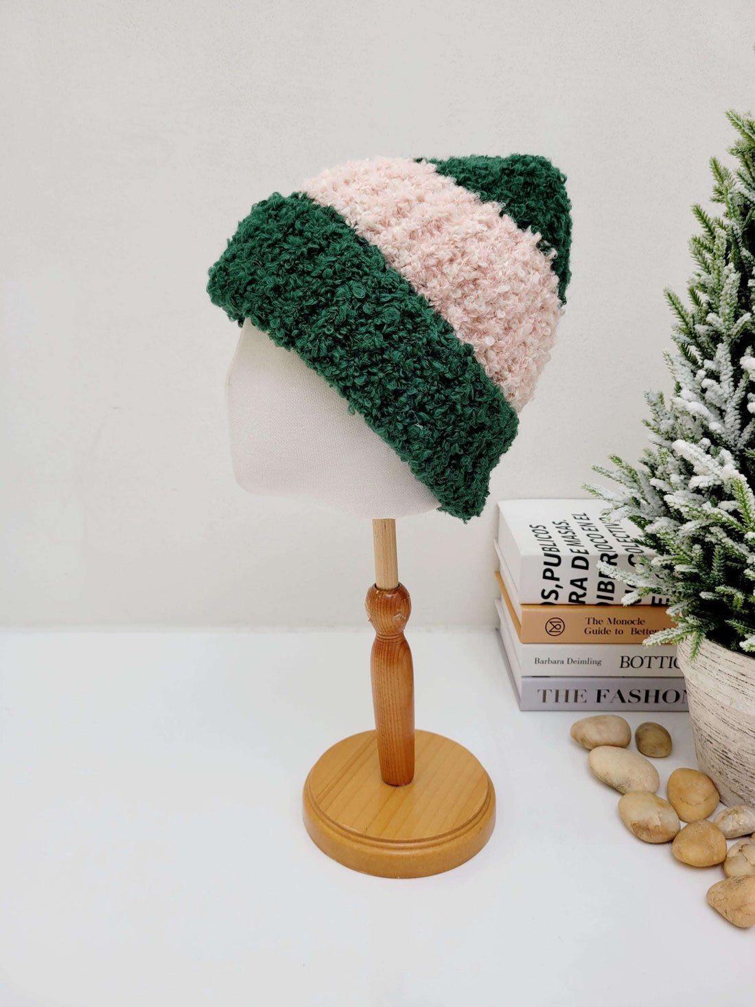 Green and pink tokyo beanie - 2tone knit hat on a mannequin head. The beanie has a fluffy texture and two-tone color blocking.
