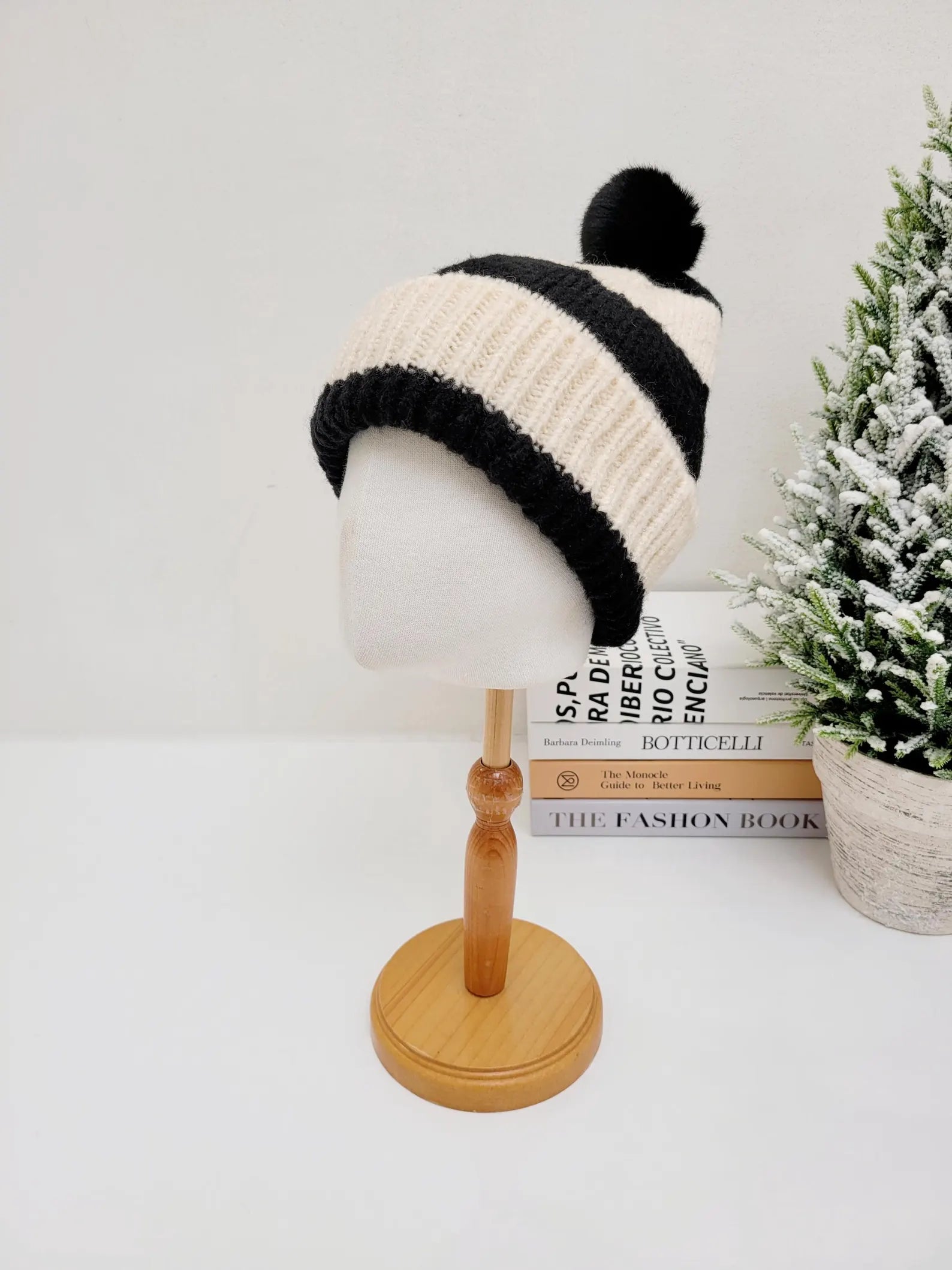 paris - b&w beanie hat: Cream and black striped knit with a fluffy black pompom. Stylish and warm winter headwear.