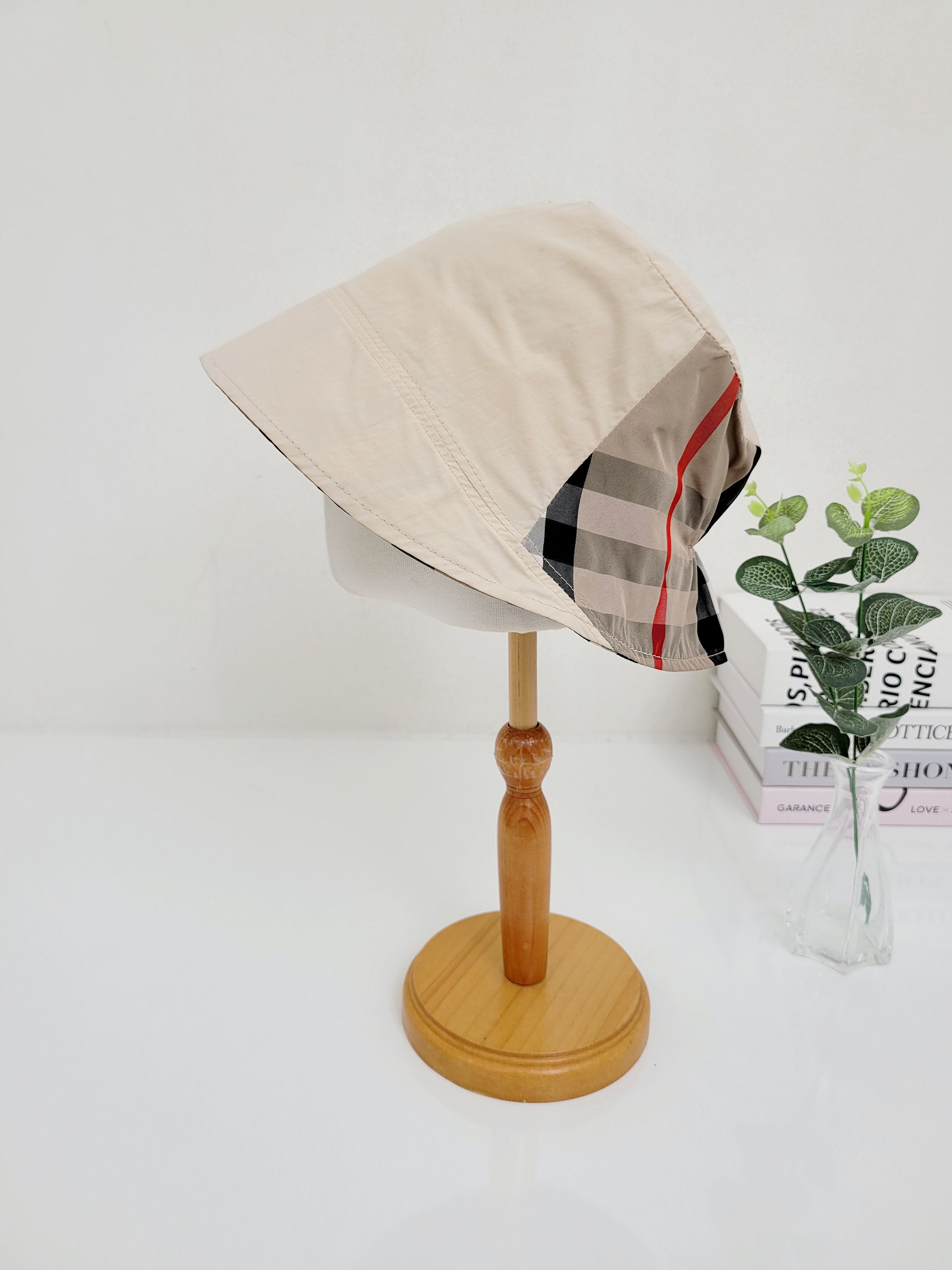 Beige salt lake bucket hat with classic plaid accent, stylish and functional sun protection