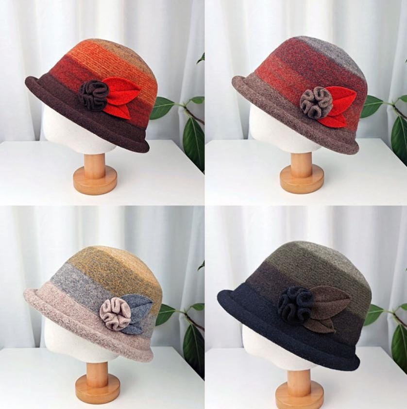 Four kelly hats in gradient felt, each with a unique color scheme and fabric flower accent. Stylish and warm.