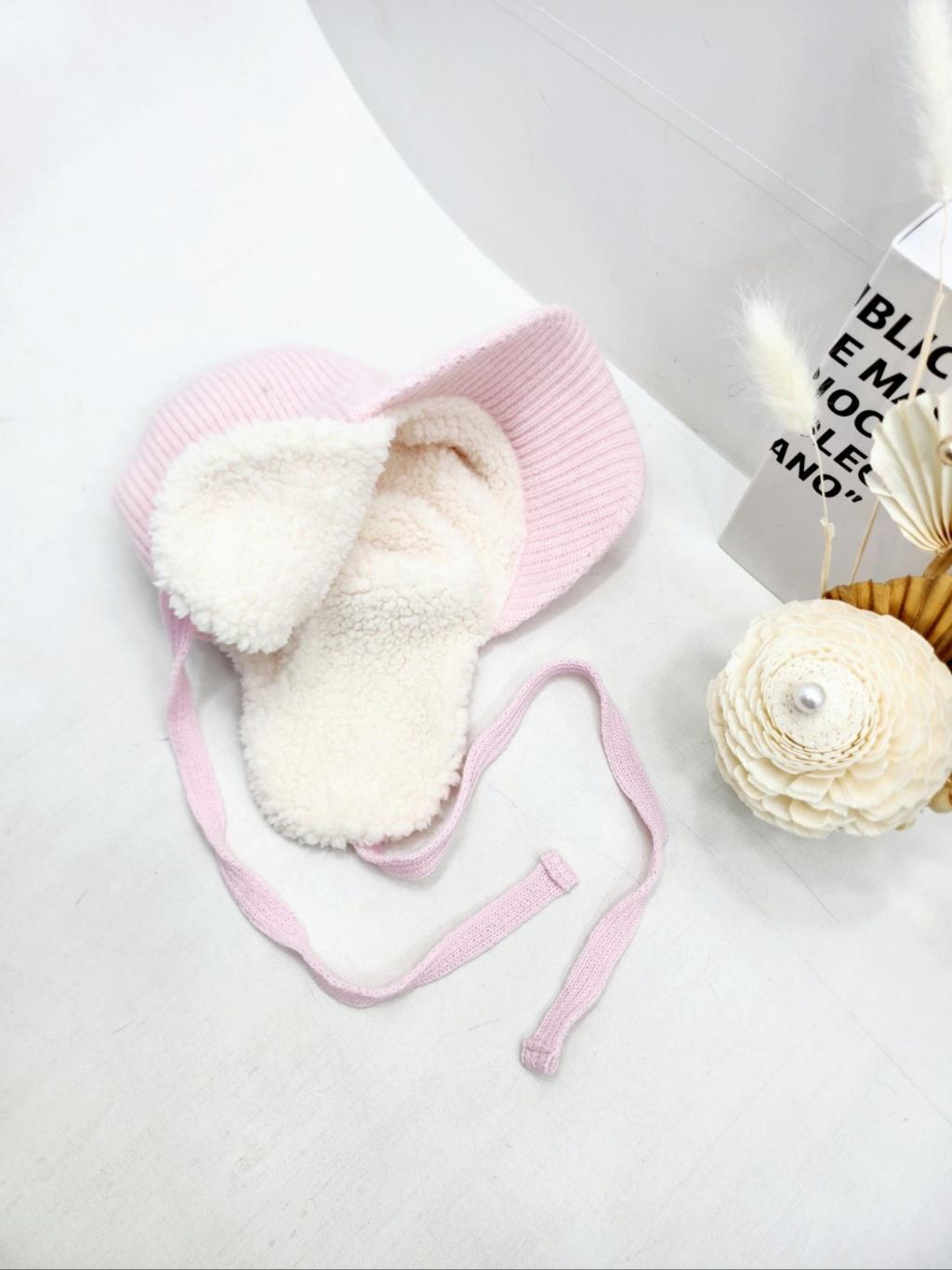 Angora trapper earflap hat in soft pink knit with cozy sherpa lining and tie strings