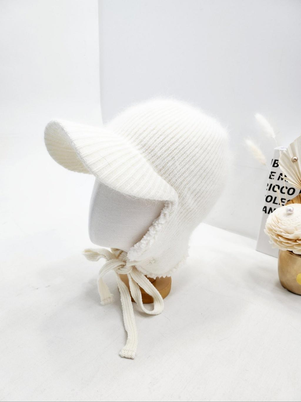 White angora trapper - earflap hat. Soft knit with brim and tie closure.